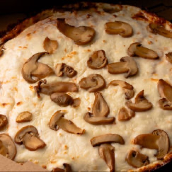 Cuban mushroom pizza with the mozzarella and gouda blend